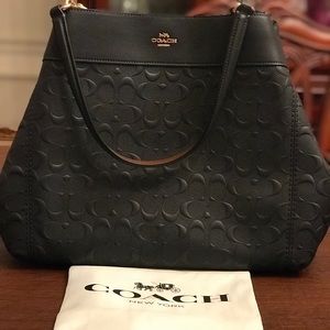 Coach signature pebble leather handbag
